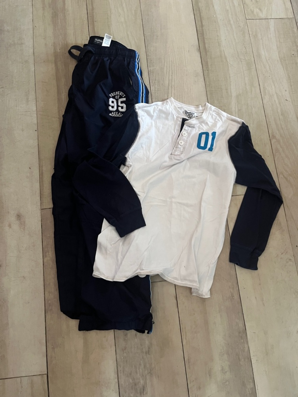OshKosh B'gosh -Size 12- Cream and Navy Graphic Tee with lined sport pants.